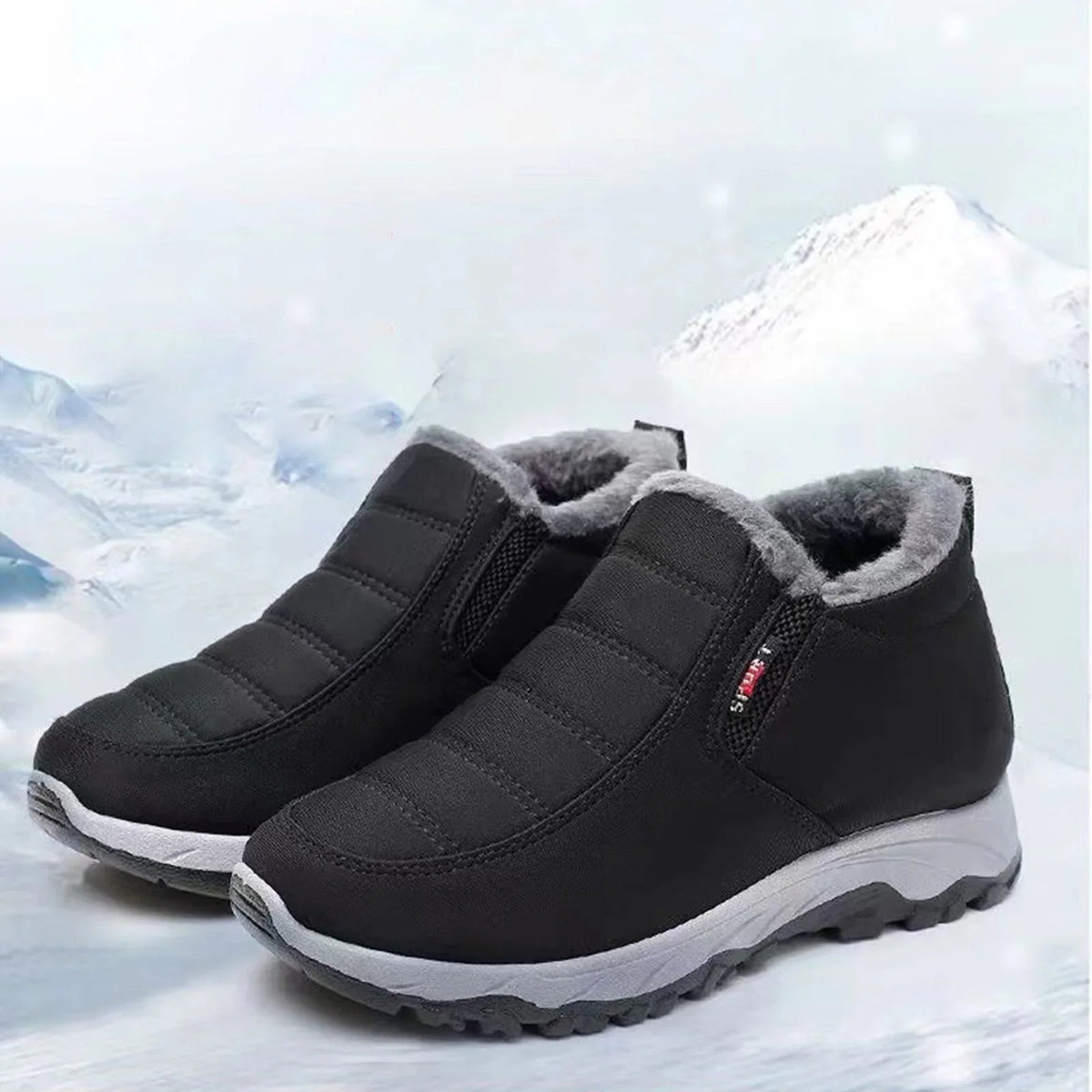 Buty zimowe damskie ocieplane – para w kolorze czarnym w zimowym krajobrazie