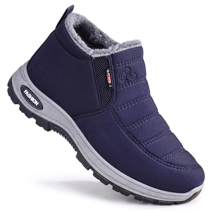 Buty zimowe damskie i męskie w kolorze granatowym, pikowane wsuwane buty na białym tle